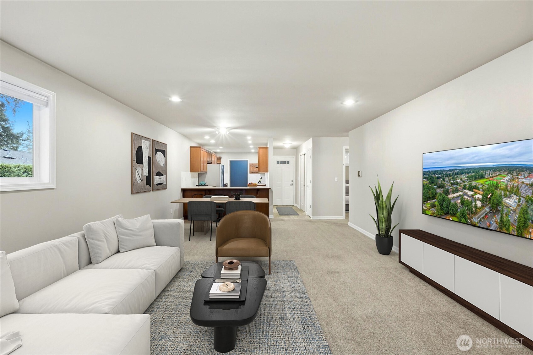 7809 218th Street Southwest, Unit 12 Edmonds, WA 98026 - Photo 8 of 34 a living room with furniture and a flat screen tv