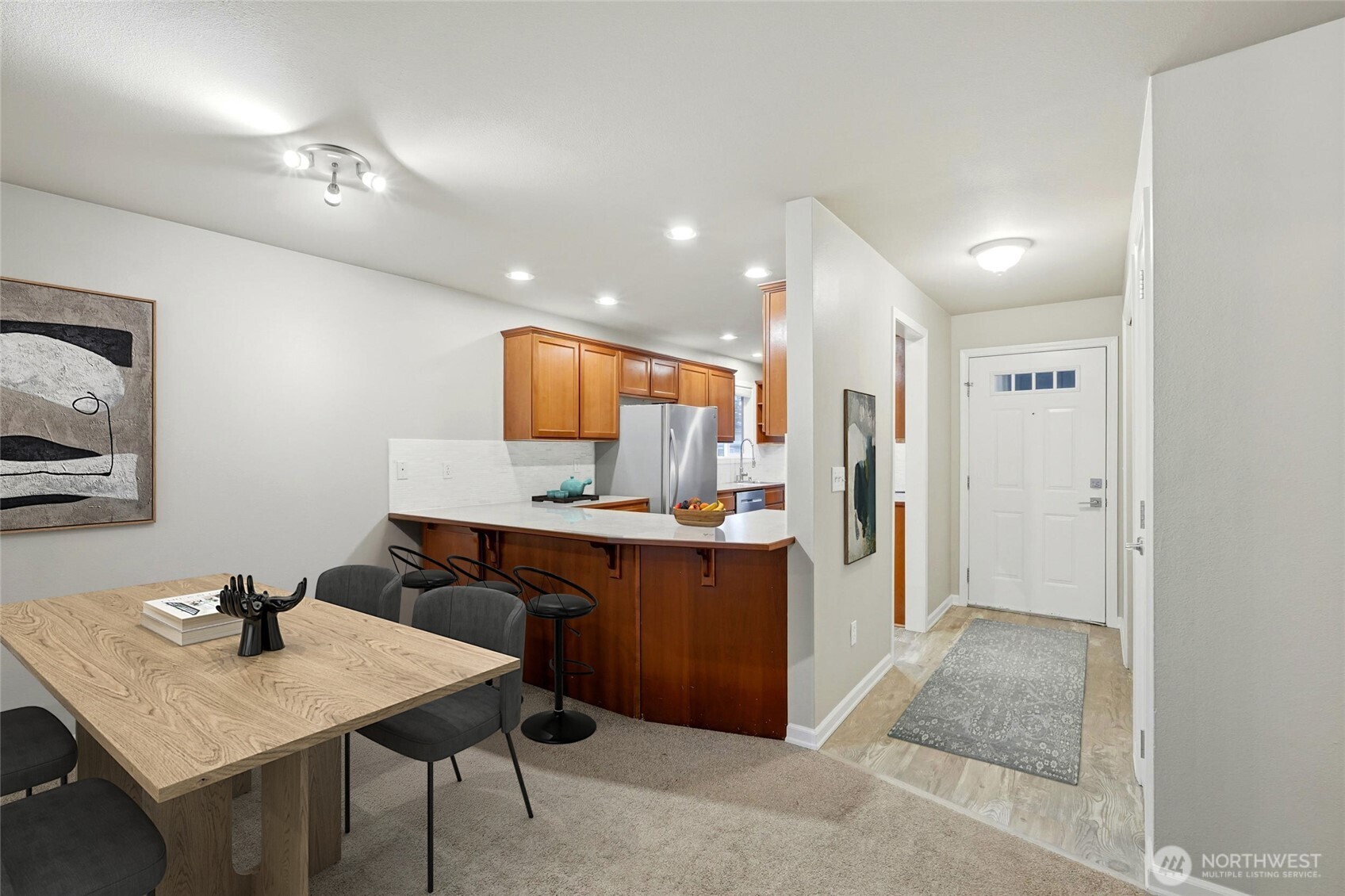7809 218th Street Southwest, Unit 12 Edmonds, WA 98026 - Photo 9 of 34 a kitchen with a sink cabinets and counter space
