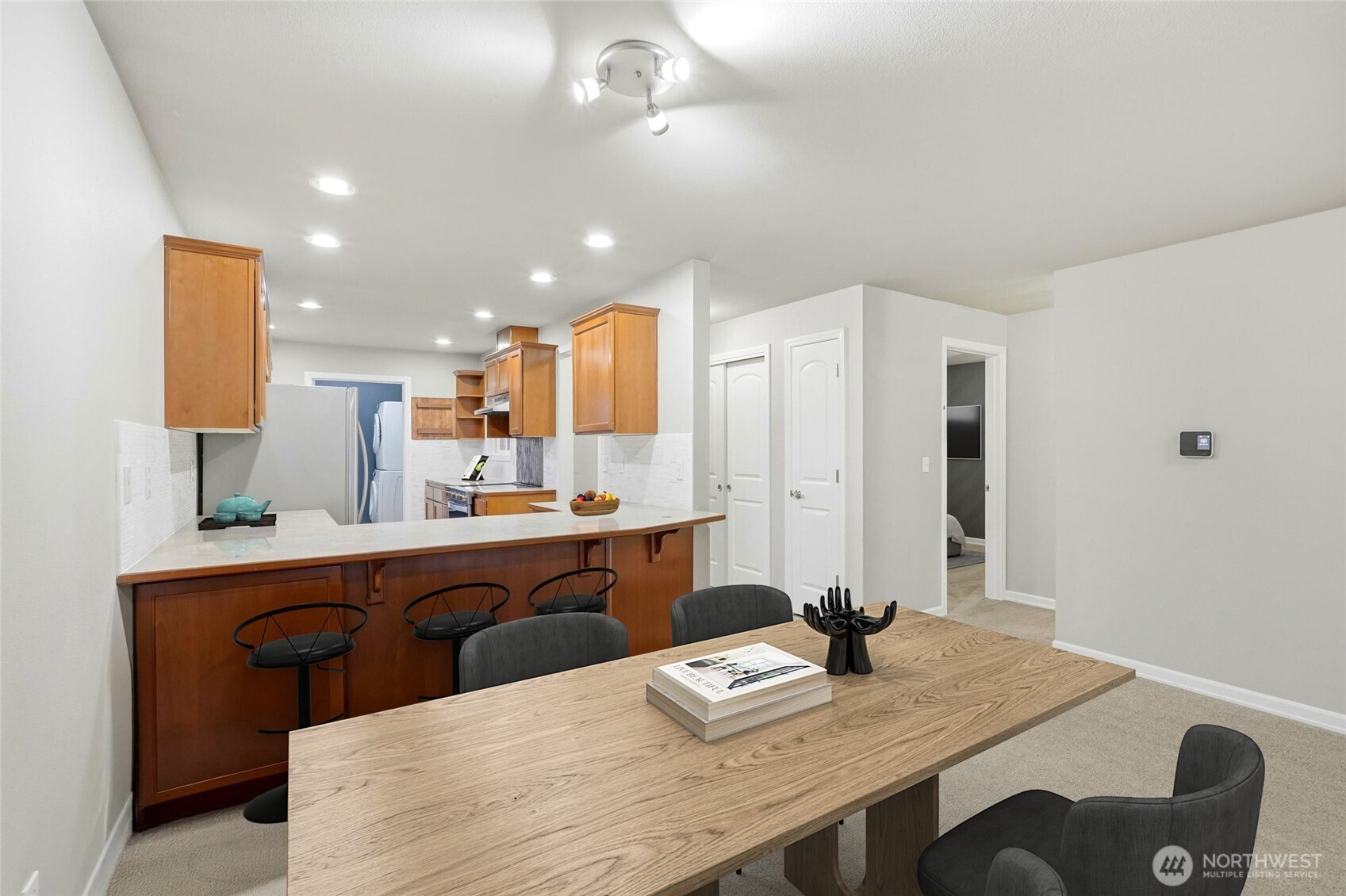 7809 218th Street Southwest, Unit 12 Edmonds, WA 98026 - Photo 10 of 34 a view of a dining room with furniture