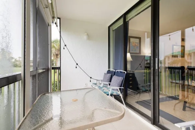 a bathroom with a tub and shower