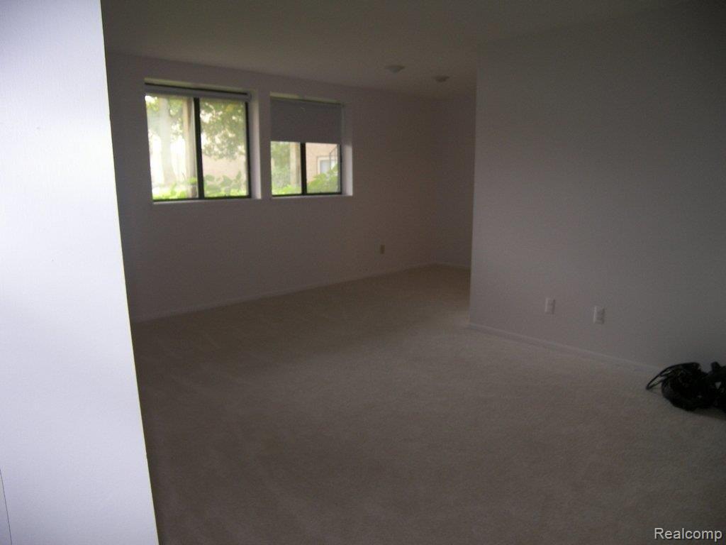30074 West 12 Mile Road, Unit 110 Farmington, MI 48334 - Photo 2 of 6 Living Room & Dining Room