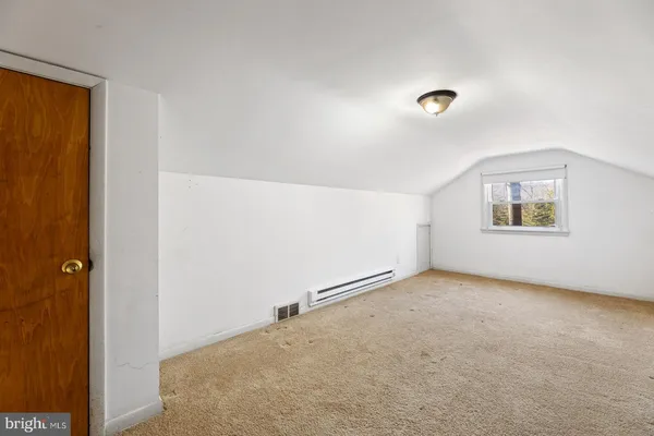 a view of an empty room with racks