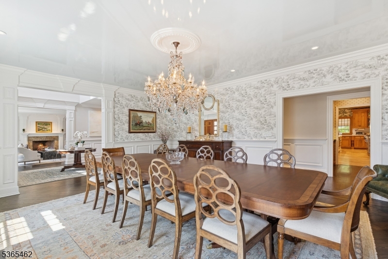 119 Mosle Road Far Hills, NJ 07931 - Photo 15 of 50 a view of a dining room with furniture and chandelier