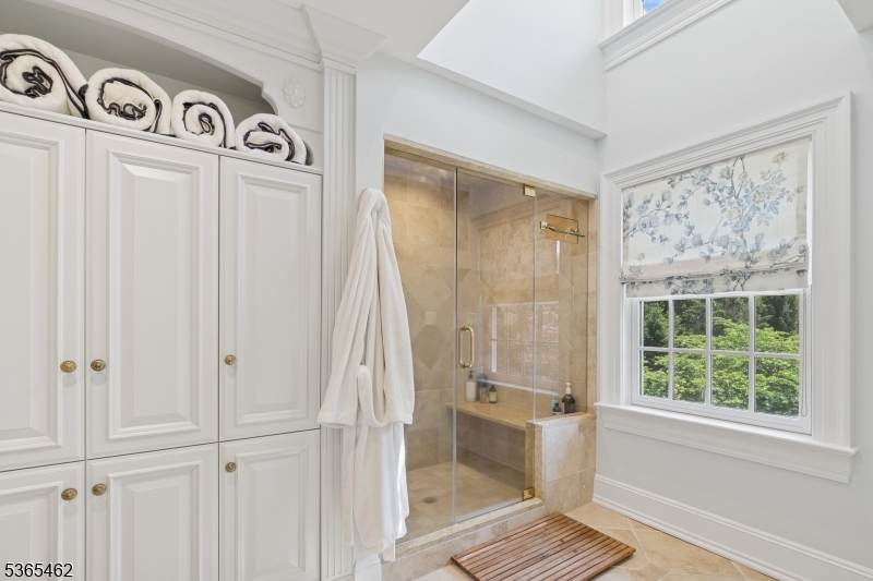 119 Mosle Road Far Hills, NJ 07931 - Photo 23 of 50 a view of a bathroom with a tub
