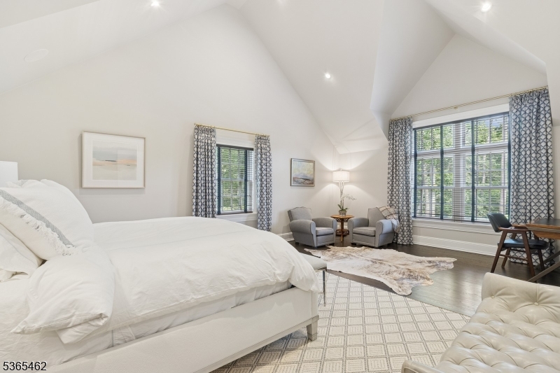 119 Mosle Road Far Hills, NJ 07931 - Photo 29 of 50 a bedroom with a bed and glass windows