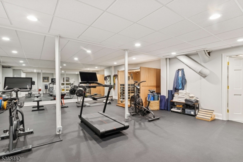 119 Mosle Road Far Hills, NJ 07931 - Photo 33 of 50 a view of a room with gym equipment