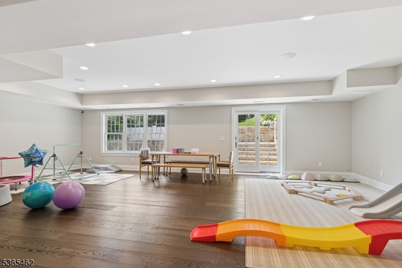 119 Mosle Road Far Hills, NJ 07931 - Photo 35 of 50 a living room with furniture and wooden floor