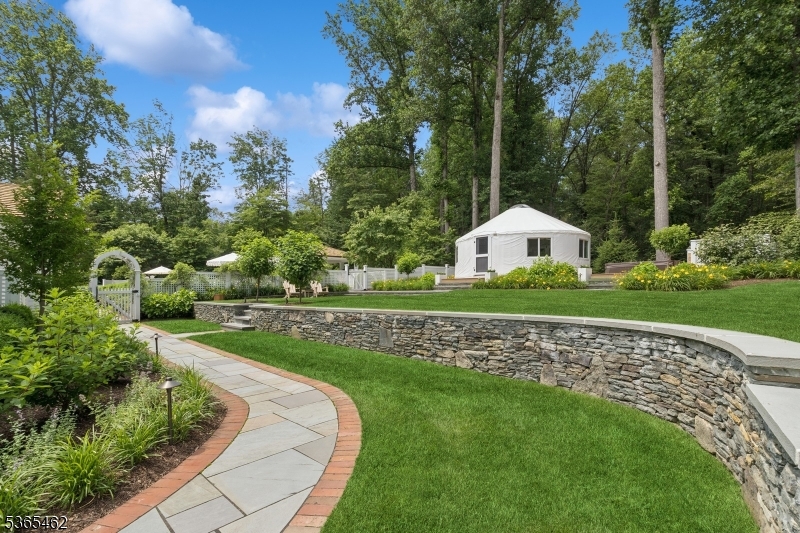 119 Mosle Road Far Hills, NJ 07931 - Photo 38 of 50 a view of a garden with house