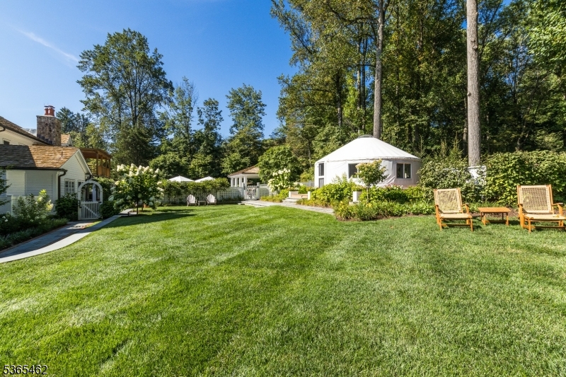 119 Mosle Road Far Hills, NJ 07931 - Photo 39 of 50 a view of a house with a yard and sitting area
