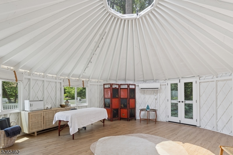 119 Mosle Road Far Hills, NJ 07931 - Photo 41 of 50 a bed room with a bed and a window