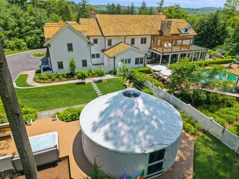 119 Mosle Road Far Hills, NJ 07931 - Photo 42 of 50 a view of a swimming pool with a patio