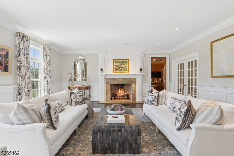 119 Mosle Road Far Hills, NJ 07931 - Photo 6 of 50 a living room with furniture and a fireplace