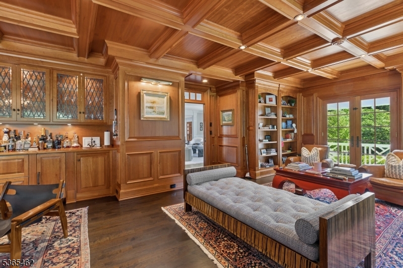 119 Mosle Road Far Hills, NJ 07931 - Photo 8 of 50 a living room with a bed and furniture