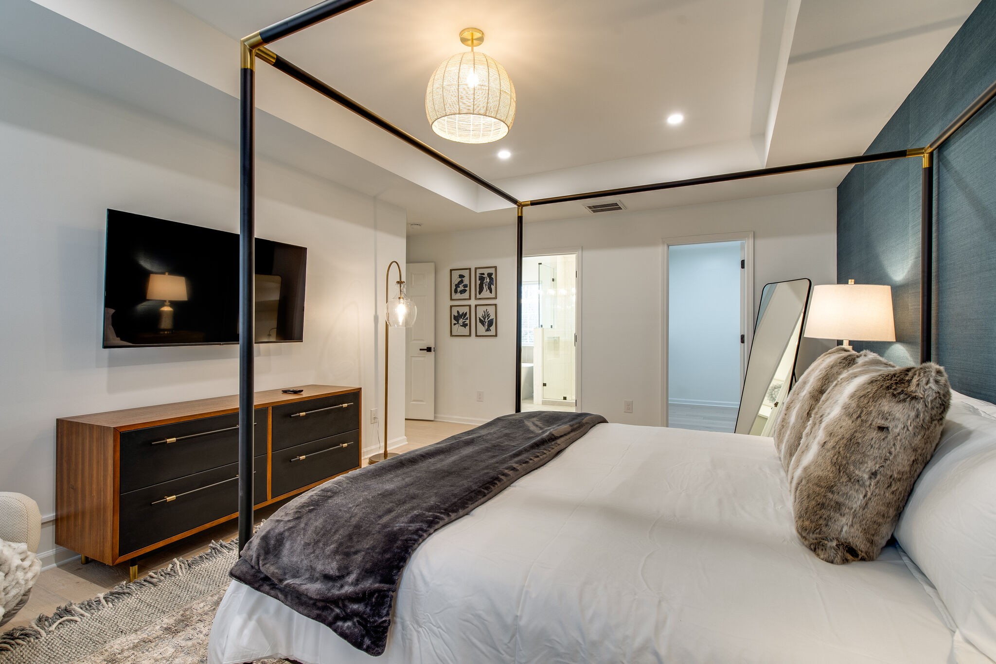 134 Stanwick Drive Franklin, TN 37067 - Photo 22 of 46 a bedroom with a bed and a flat screen tv