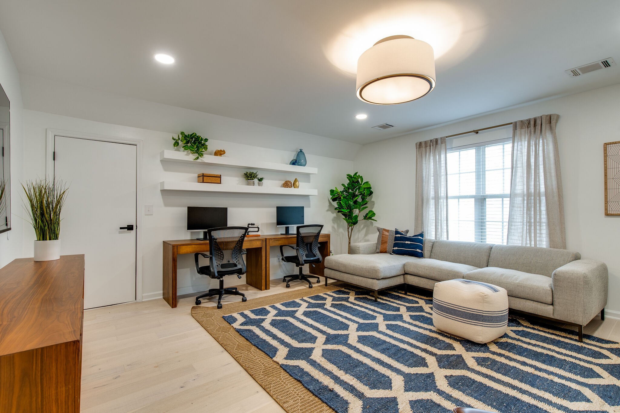 134 Stanwick Drive Franklin, TN 37067 - Photo 26 of 46 a living room with furniture and a large window