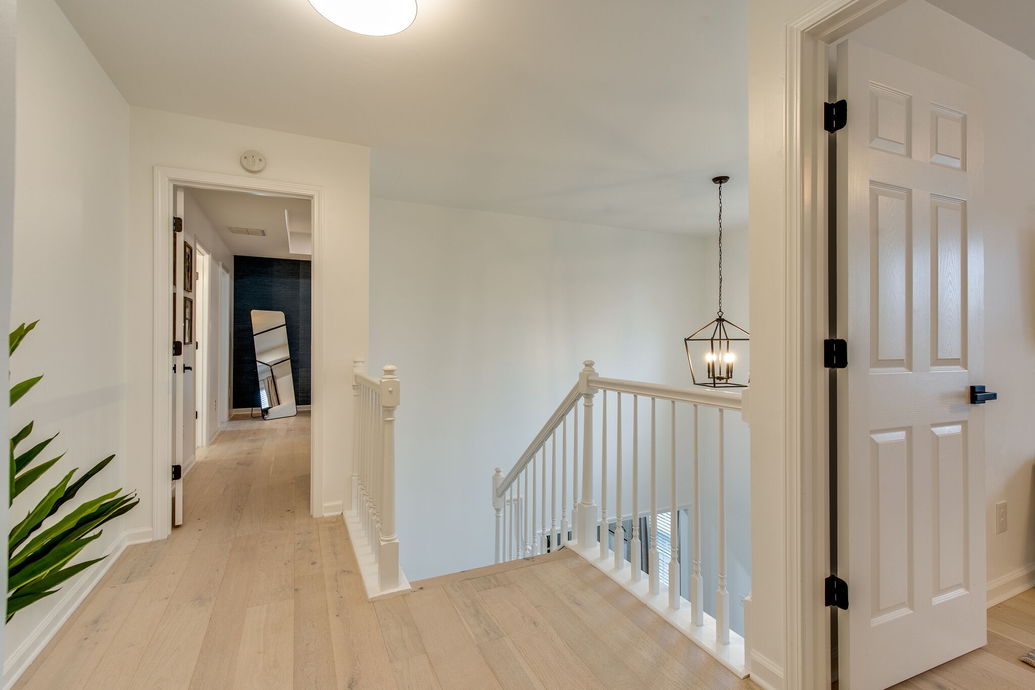 134 Stanwick Drive Franklin, TN 37067 - Photo 32 of 46 a view of a hallway with a white walls and stairs
