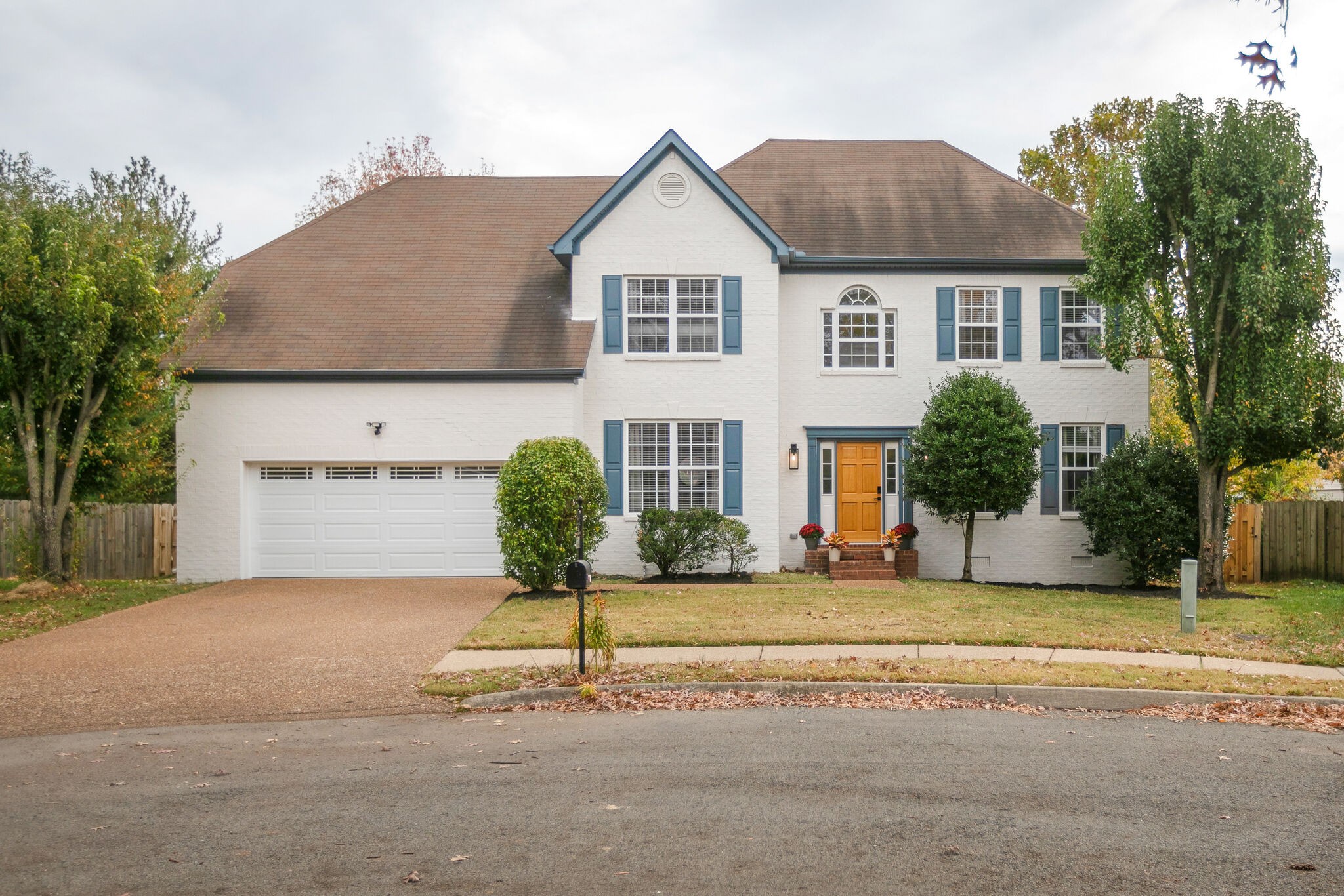 134 Stanwick Drive Franklin, TN 37067 - Photo 36 of 46 a front view of a house with a yard and garage