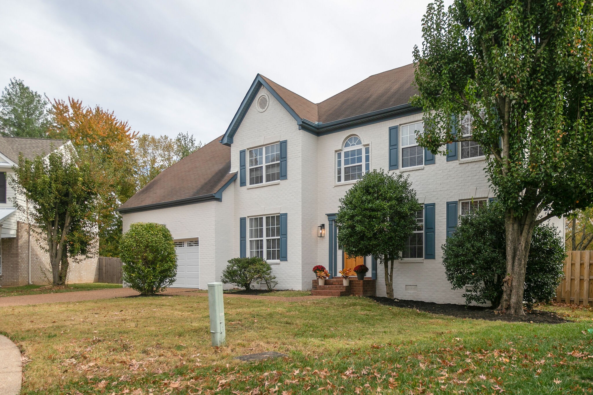134 Stanwick Drive Franklin, TN 37067 - Photo 37 of 46 a front view of a house with a yard and garage