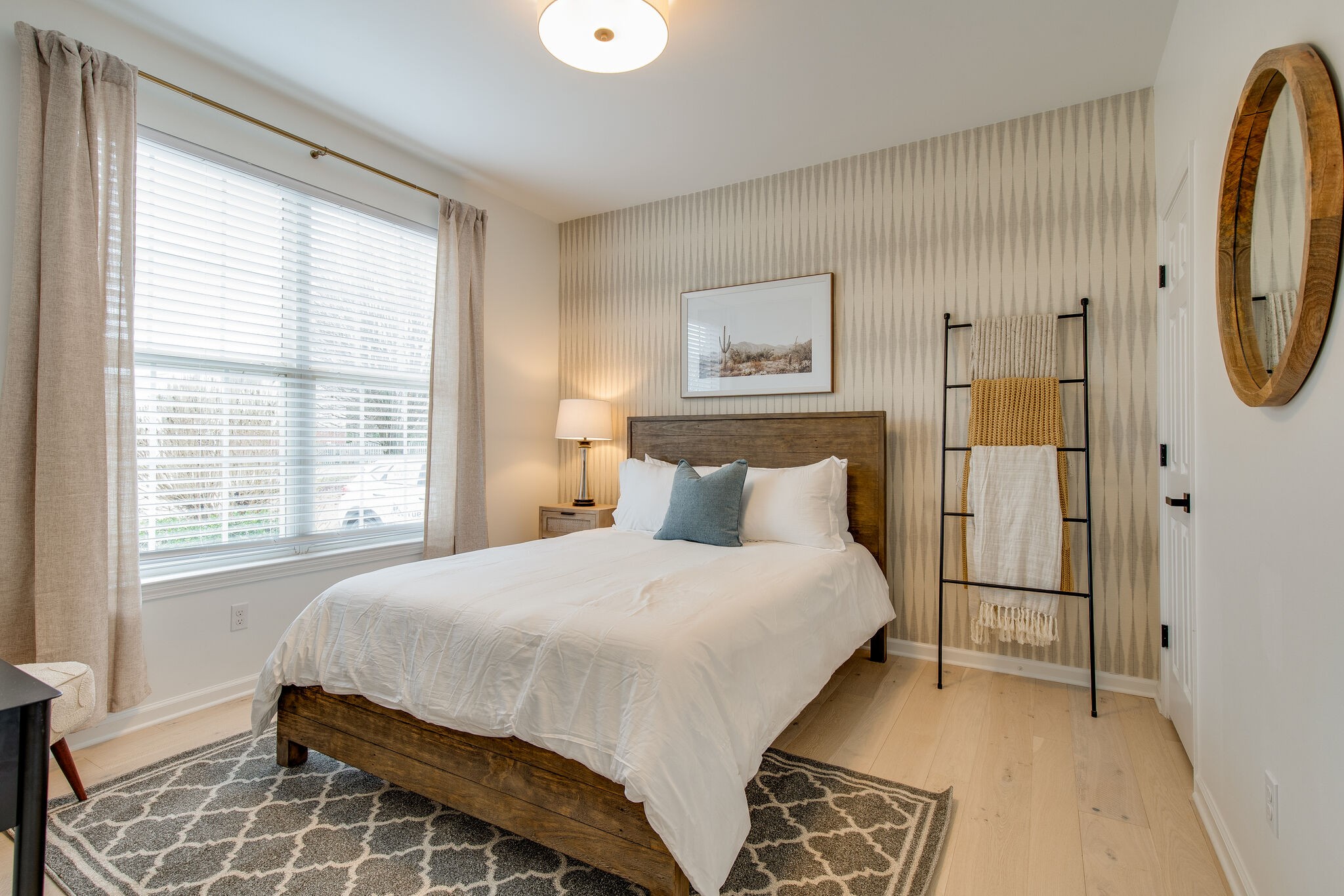 134 Stanwick Drive Franklin, TN 37067 - Photo 9 of 46 a spacious bedroom with a bed and a window