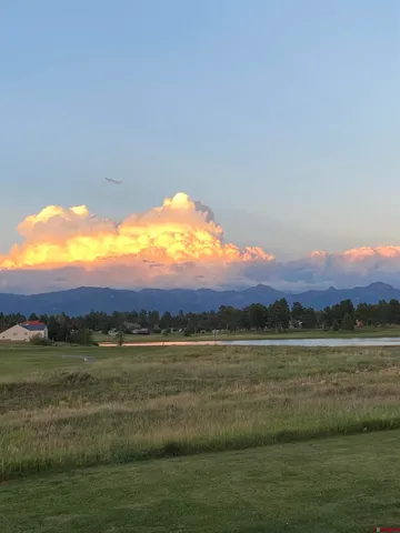 a view of an ocean and mountain