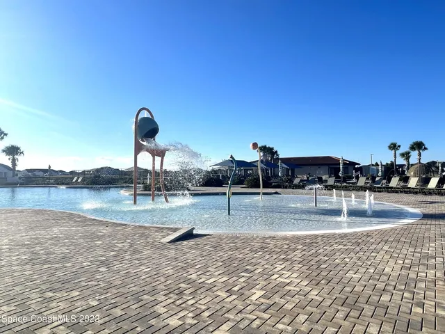 a view of a swimming pool with a outdoor space