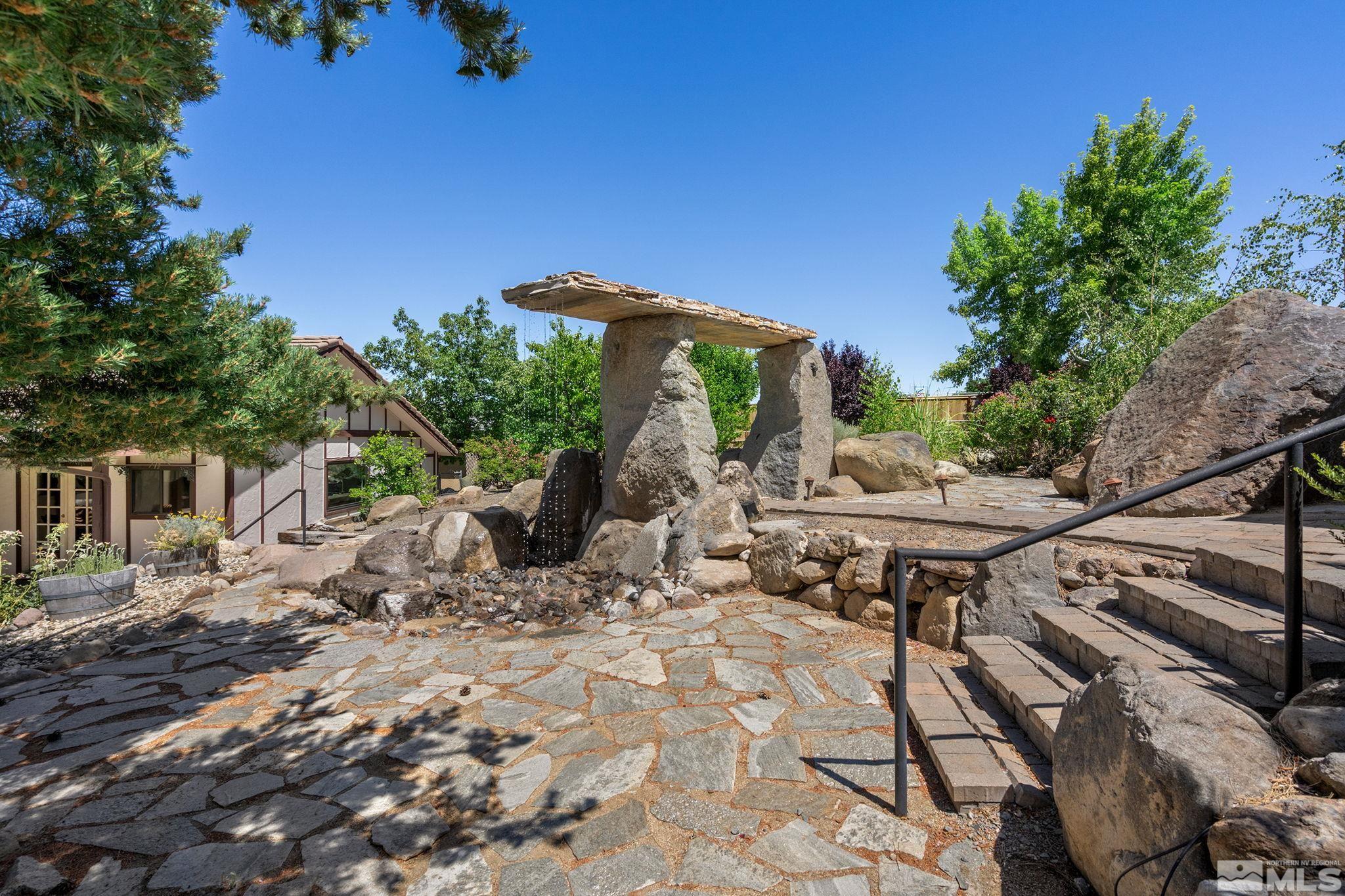 15 Pecetti Circle Reno, NV 89511 - Photo 35 of 40 a view of a backyard with furniture and a garden