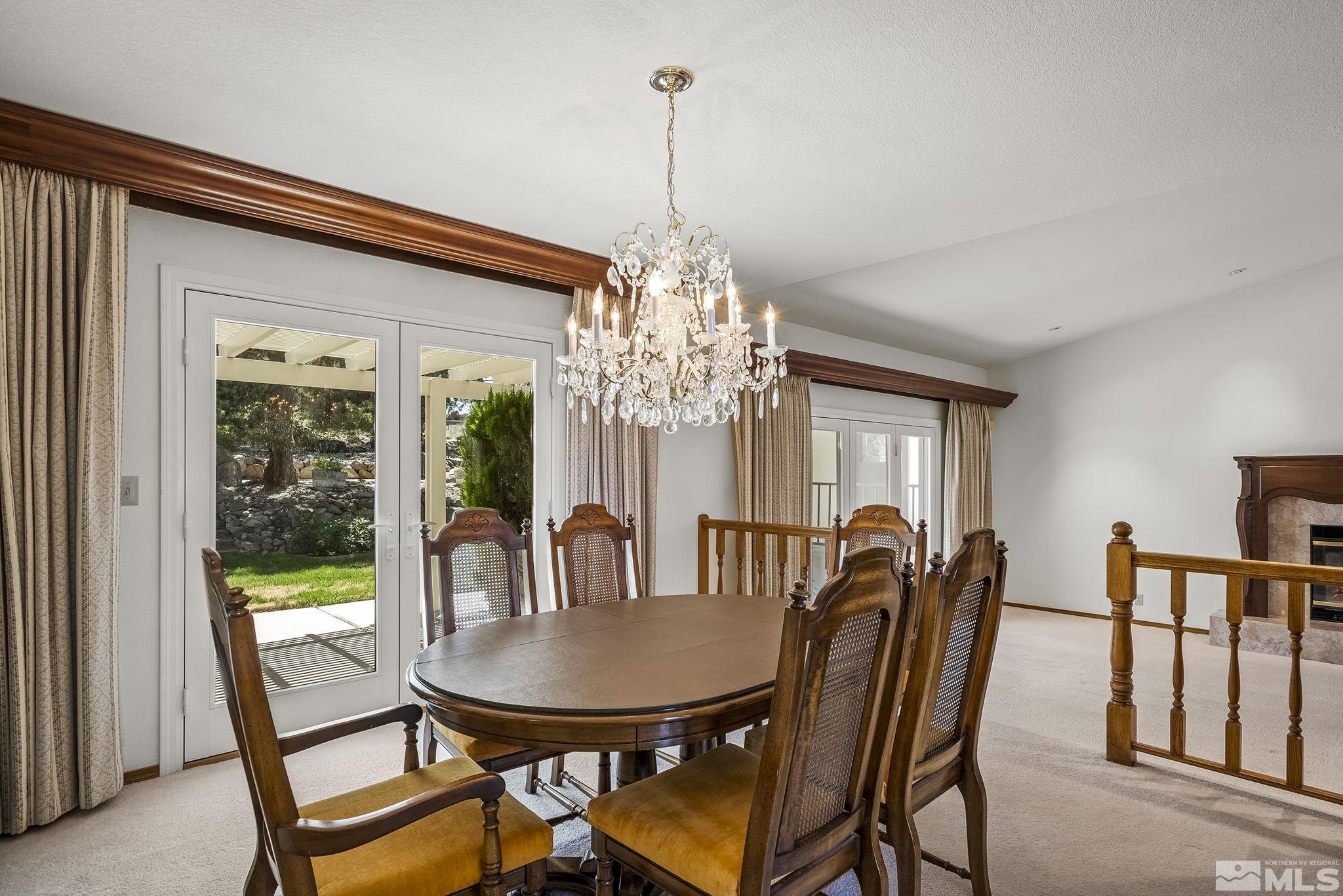 15 Pecetti Circle Reno, NV 89511 - Photo 8 of 40 a view of a dining room with furniture window and outside view