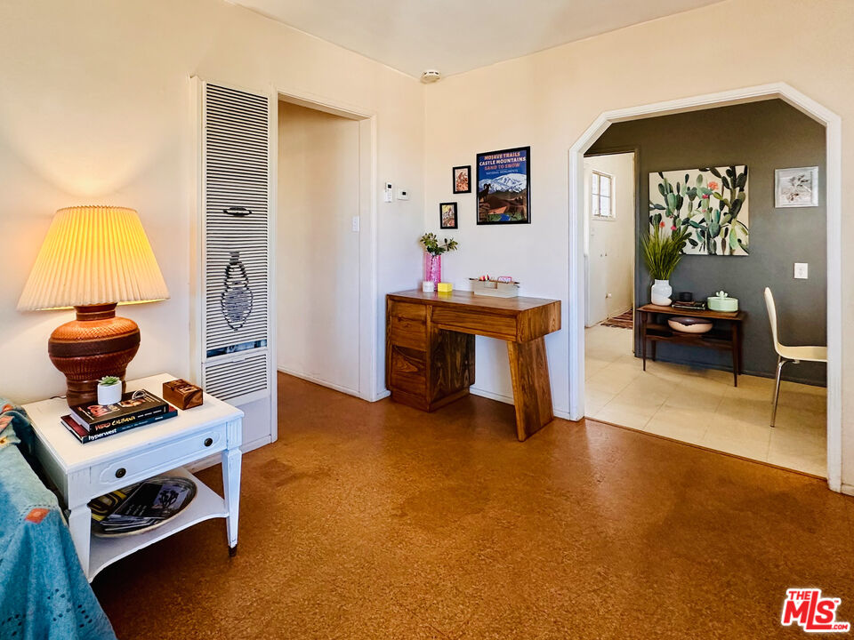61855 Valley View Circle Joshua Tree, CA 92252 - Photo 15 of 59 a living room with furniture and a flat screen tv