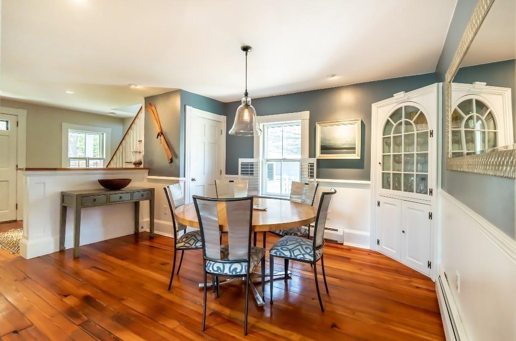 207 Highland Road Andover, MA 01810 - Photo 12 of 35 a view of a dining room with furniture window and wooden floor