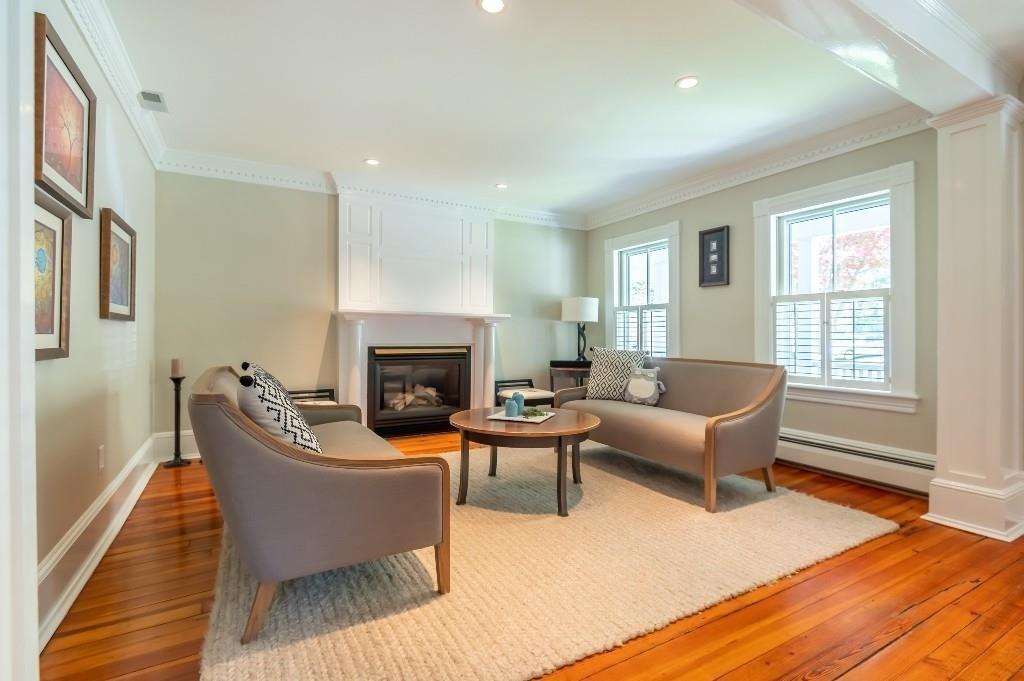 207 Highland Road Andover, MA 01810 - Photo 14 of 35 a living room with furniture and a fireplace