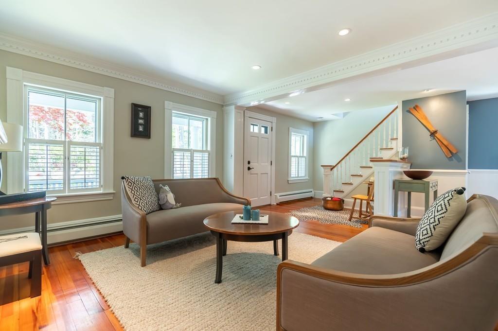207 Highland Road Andover, MA 01810 - Photo 15 of 35 a living room with furniture and a potted plant
