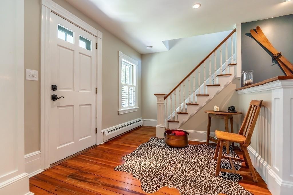 207 Highland Road Andover, MA 01810 - Photo 16 of 35 a bedroom with furniture staircase and a rug