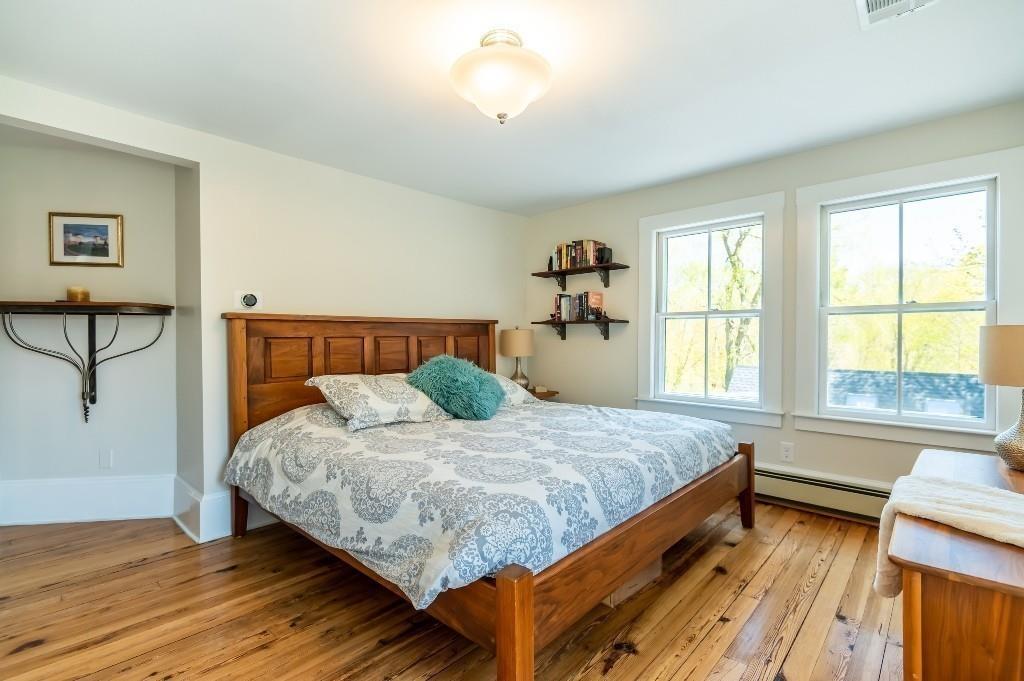 207 Highland Road Andover, MA 01810 - Photo 18 of 35 a bedroom with a bed and a window