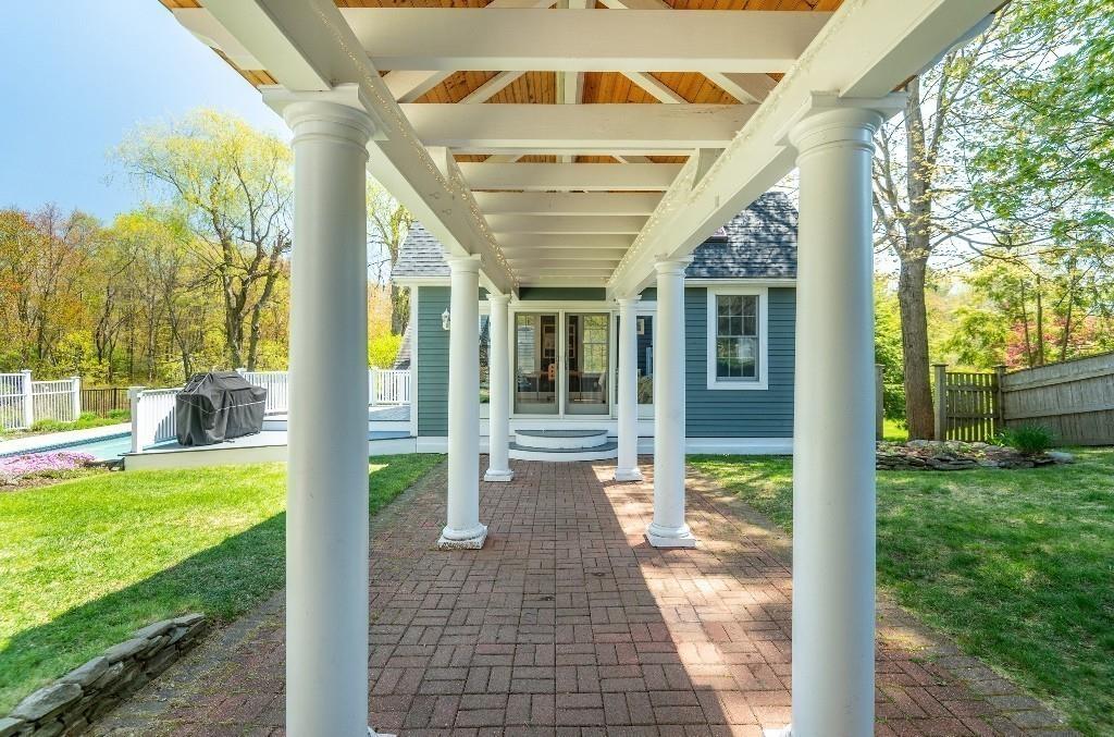 207 Highland Road Andover, MA 01810 - Photo 23 of 35 a view of a porch with garden