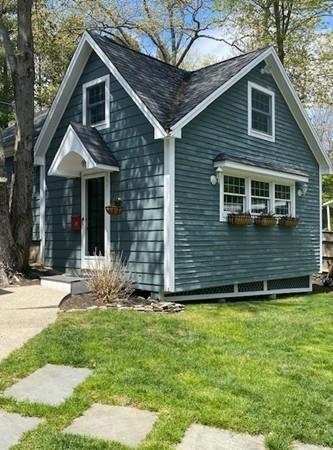 207 Highland Road Andover, MA 01810 - Photo 28 of 35 a front view of a house with garden
