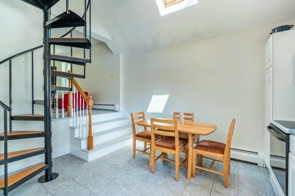 207 Highland Road Andover, MA 01810 - Photo 31 of 35 a view of a livingroom with furniture and staircase