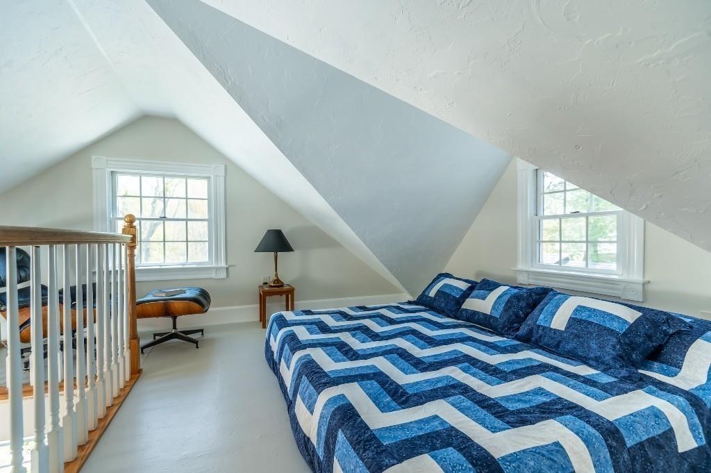 207 Highland Road Andover, MA 01810 - Photo 32 of 35 a bedroom with a bed and a large window