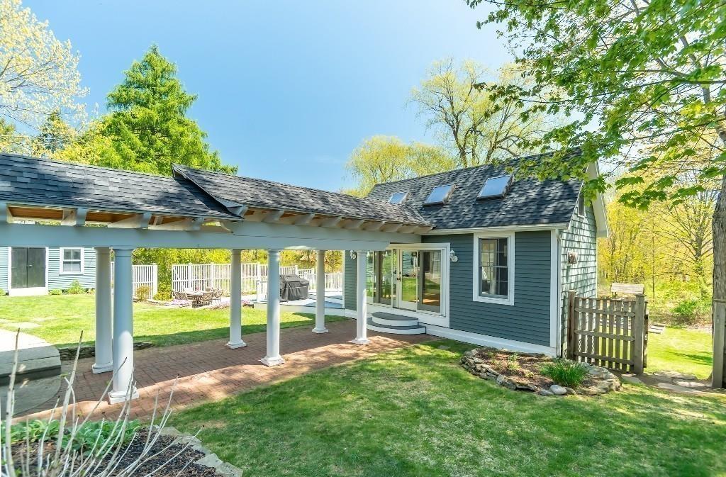 207 Highland Road Andover, MA 01810 - Photo 33 of 35 a view of a house with backyard and a tree