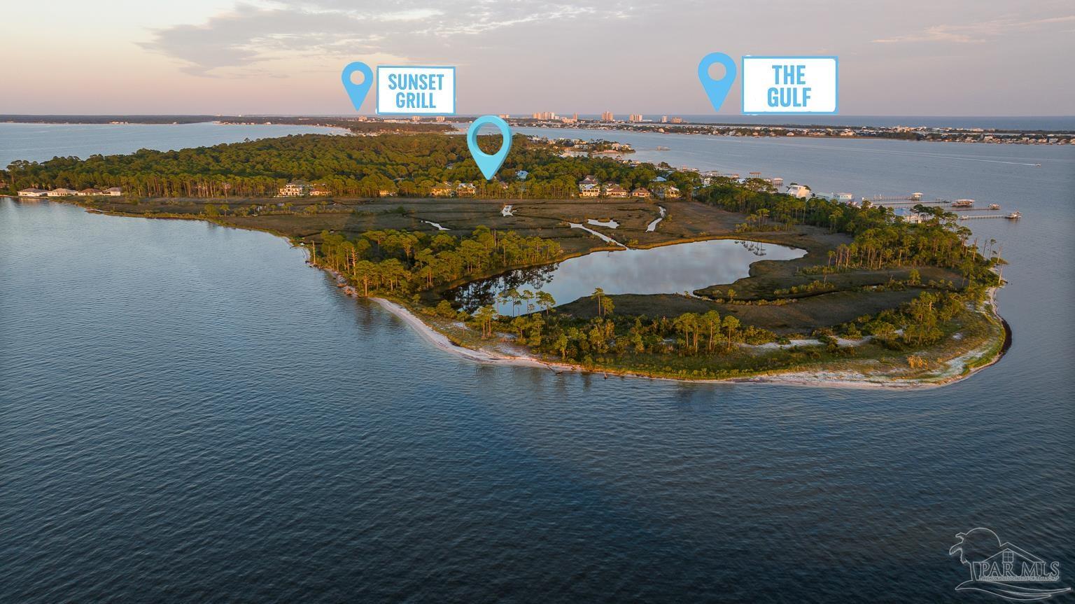 5400 North Shore Road Pensacola, FL 32507 - Photo 2 of 22 a view of a ocean with beach