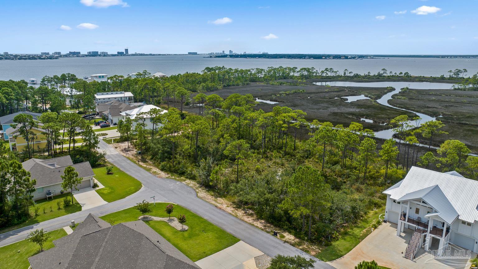 5400 North Shore Road Pensacola, FL 32507 - Photo 5 of 22 an aerial view of lake and city