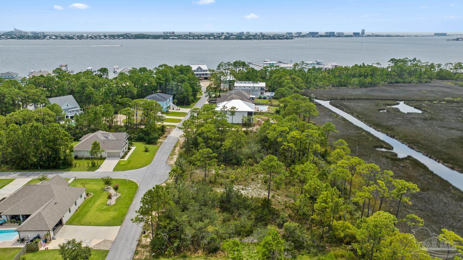 5400 North Shore Road Pensacola, FL 32507 - Photo 6 of 22 a aerial view of a house with a lake view