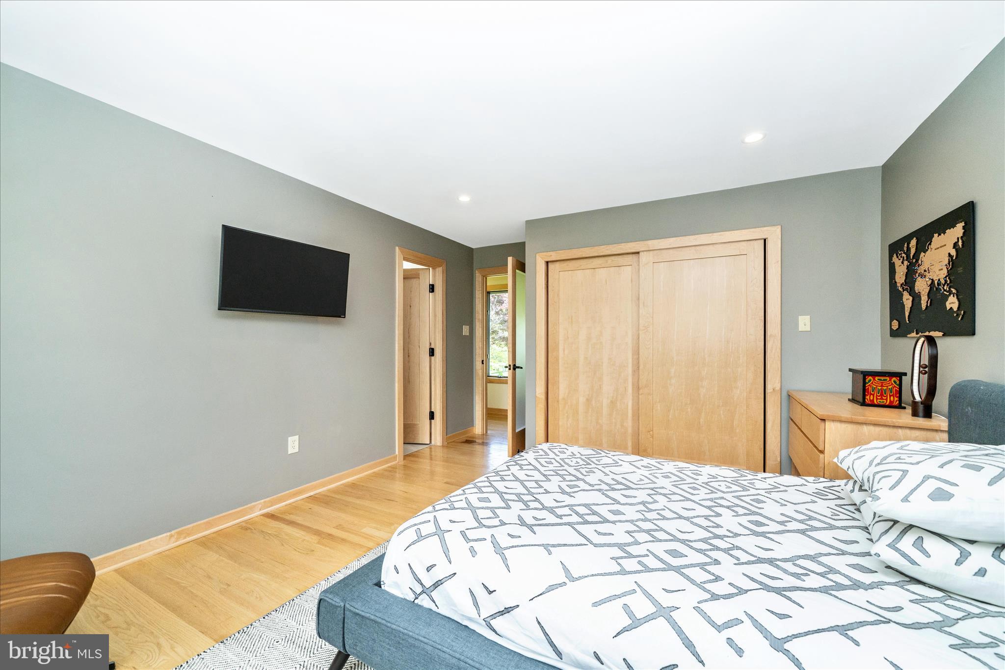 9237 Frostown Road Middletown, MD 21769 - Photo 44 of 113 a bedroom with a bed and a flat screen tv