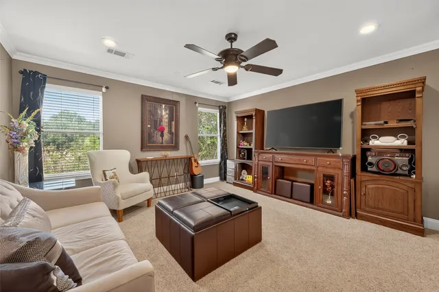 a view of a livingroom with furniture and toys