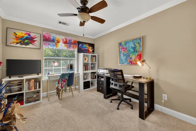 a view of a workspace with furniture