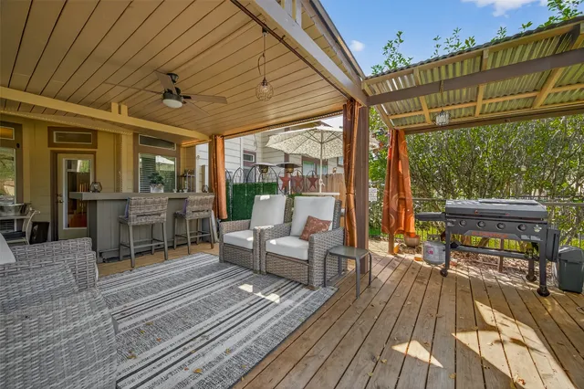 a view of a patio on the roof deck