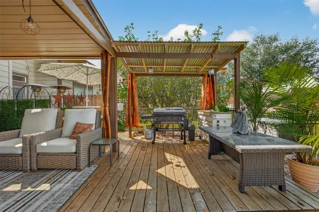 a view of a chairs and table in the patio