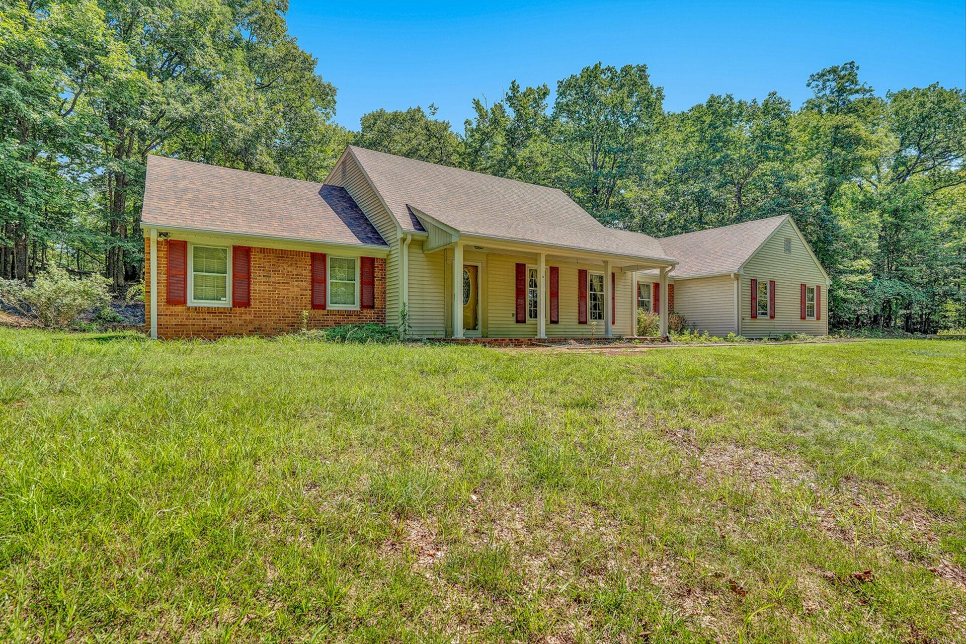 368 Foxcroft Drive Blue Ridge, VA 24064 - Photo 2 of 39 a front view of house with yard and green space