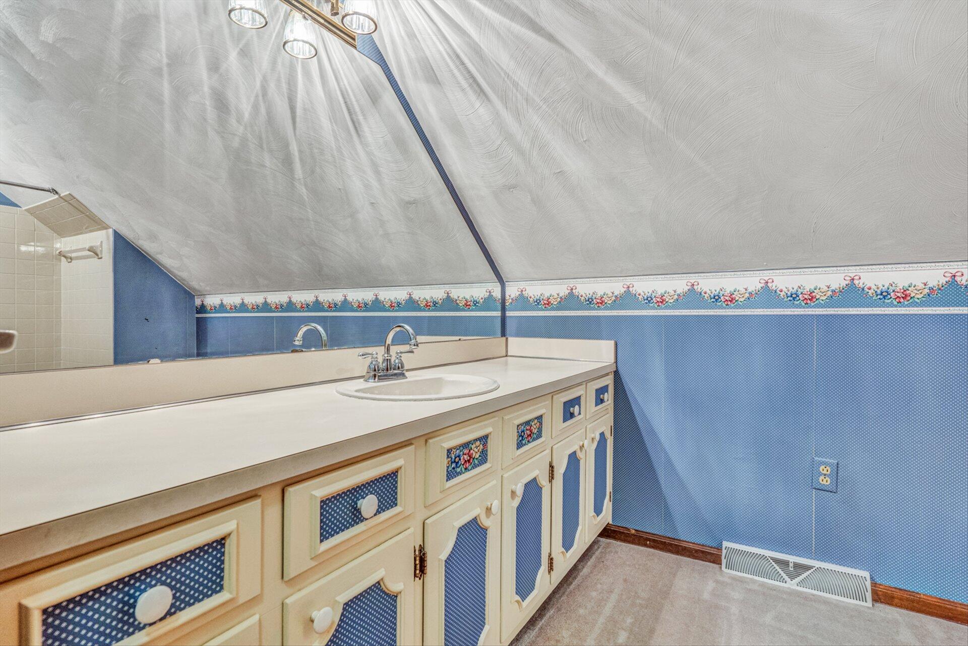 368 Foxcroft Drive Blue Ridge, VA 24064 - Photo 29 of 39 a bathroom with a sink and a mirror