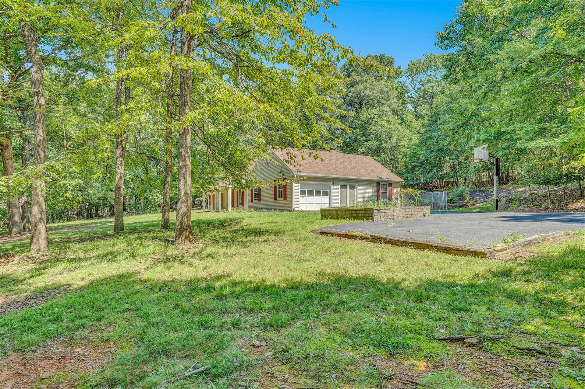 368 Foxcroft Drive Blue Ridge, VA 24064 - Photo 3 of 39 a aerial view of a house with swimming pool next to a big yard