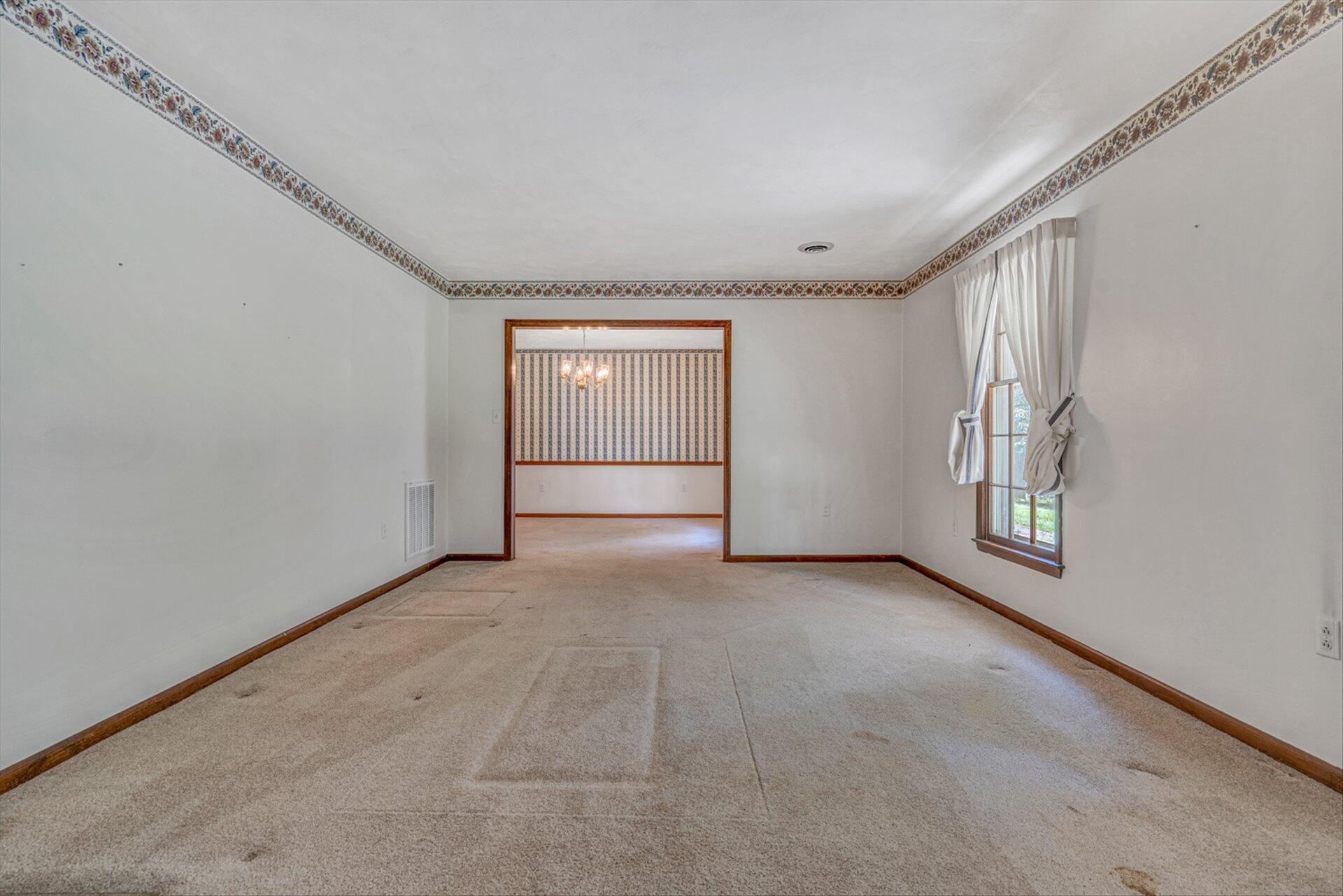 368 Foxcroft Drive Blue Ridge, VA 24064 - Photo 6 of 39 an empty room with windows